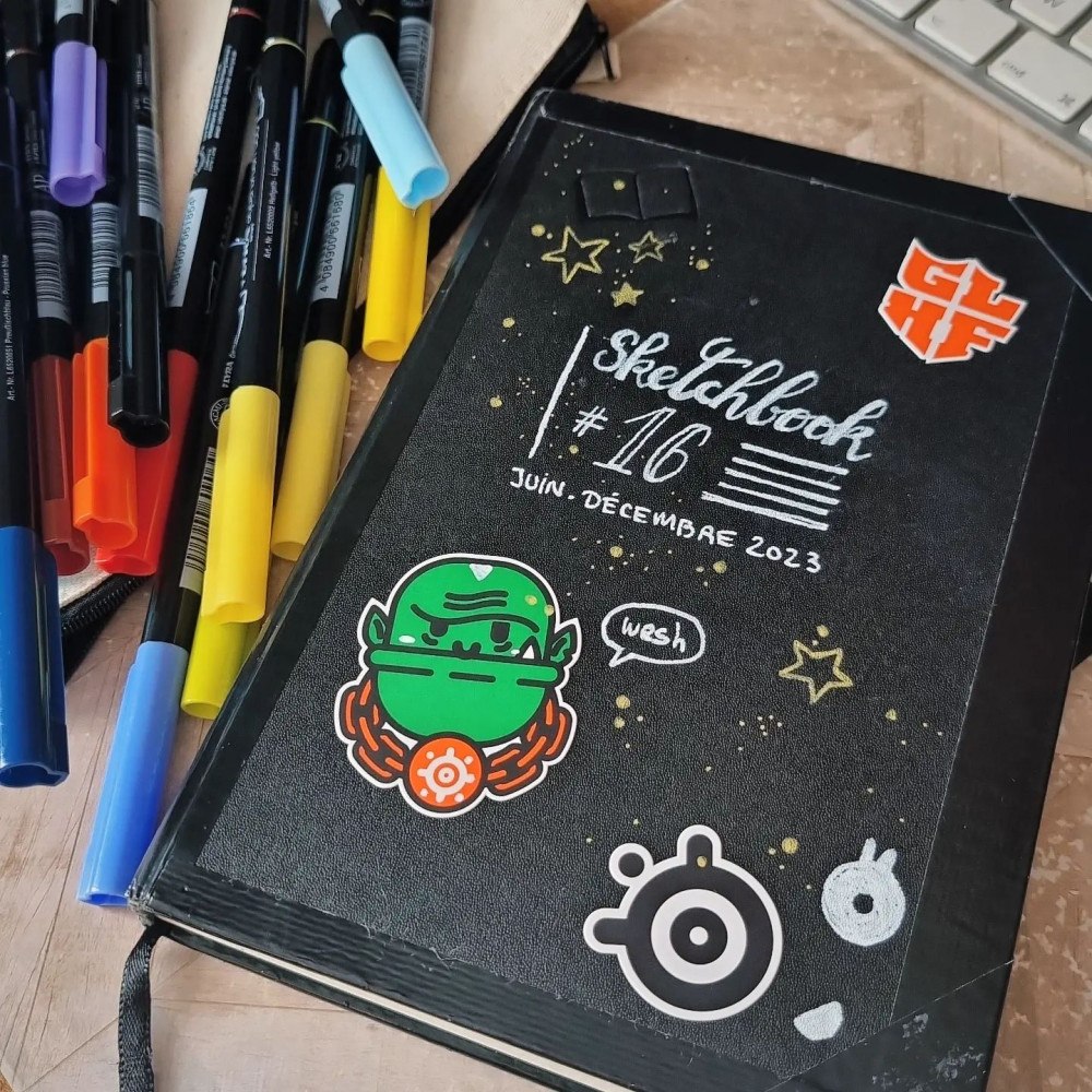 couverture de carnet type moleskine, intitulé Sketchbook n°16 - Juin-Décembre 2023